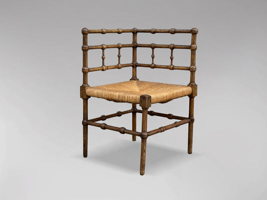 20TH CENTURY FRENCH OAK BOBBIN CORNER CHAIR, CIRCA 1920