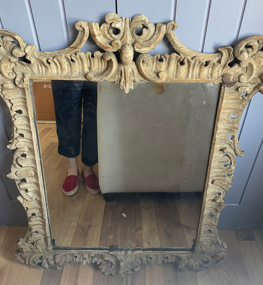 Late 17th/Early 18th century impressive limewood frame housing a mirror.