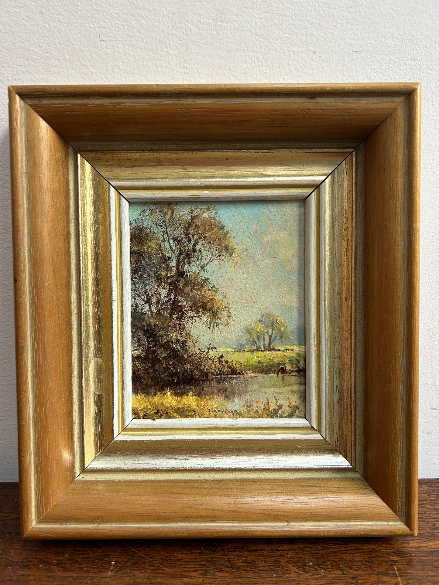 A stunning little oil  by Suffolk artist Joe Crowfoot  Titles River “Waverney” at Ellington housed in a high quality gilt frame.