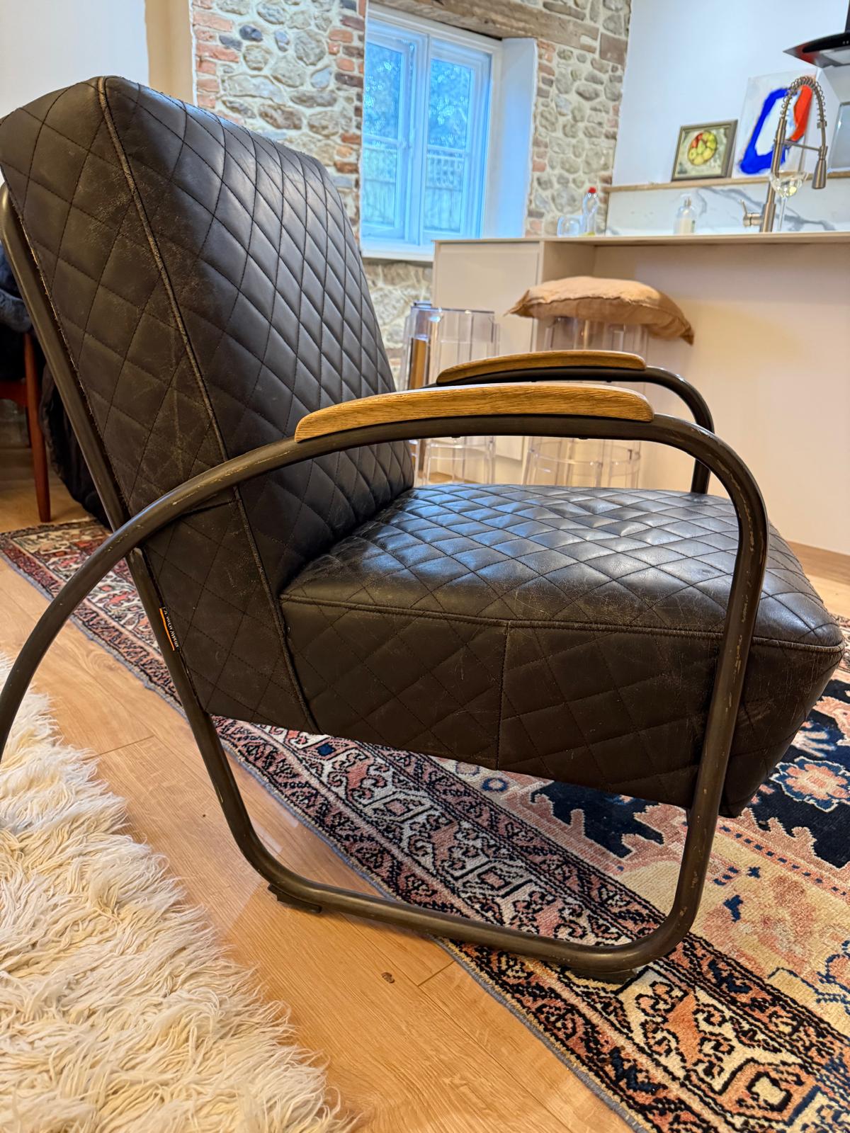 Andrew Martin Black Leather Quilted Bent Metal Arm Chair