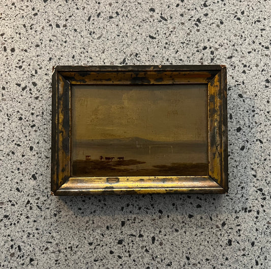 Bovini delle Highland presso un lago